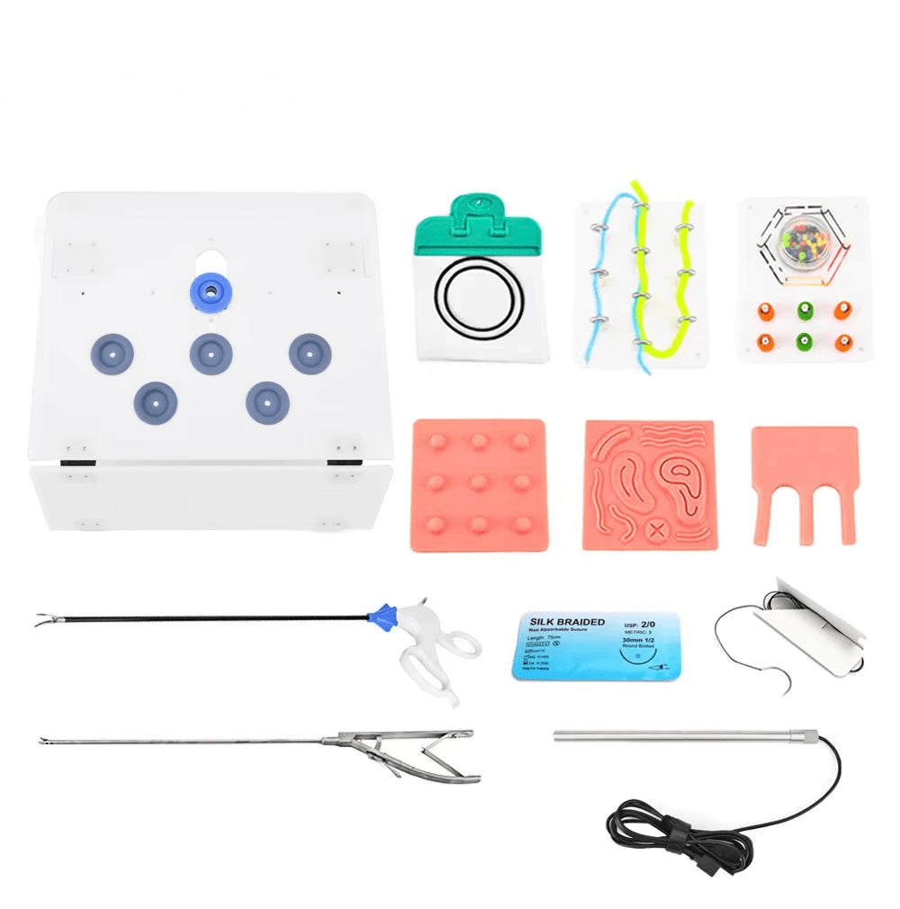 Endo Trainer tissue training modules and laparoscopic instruments laid out